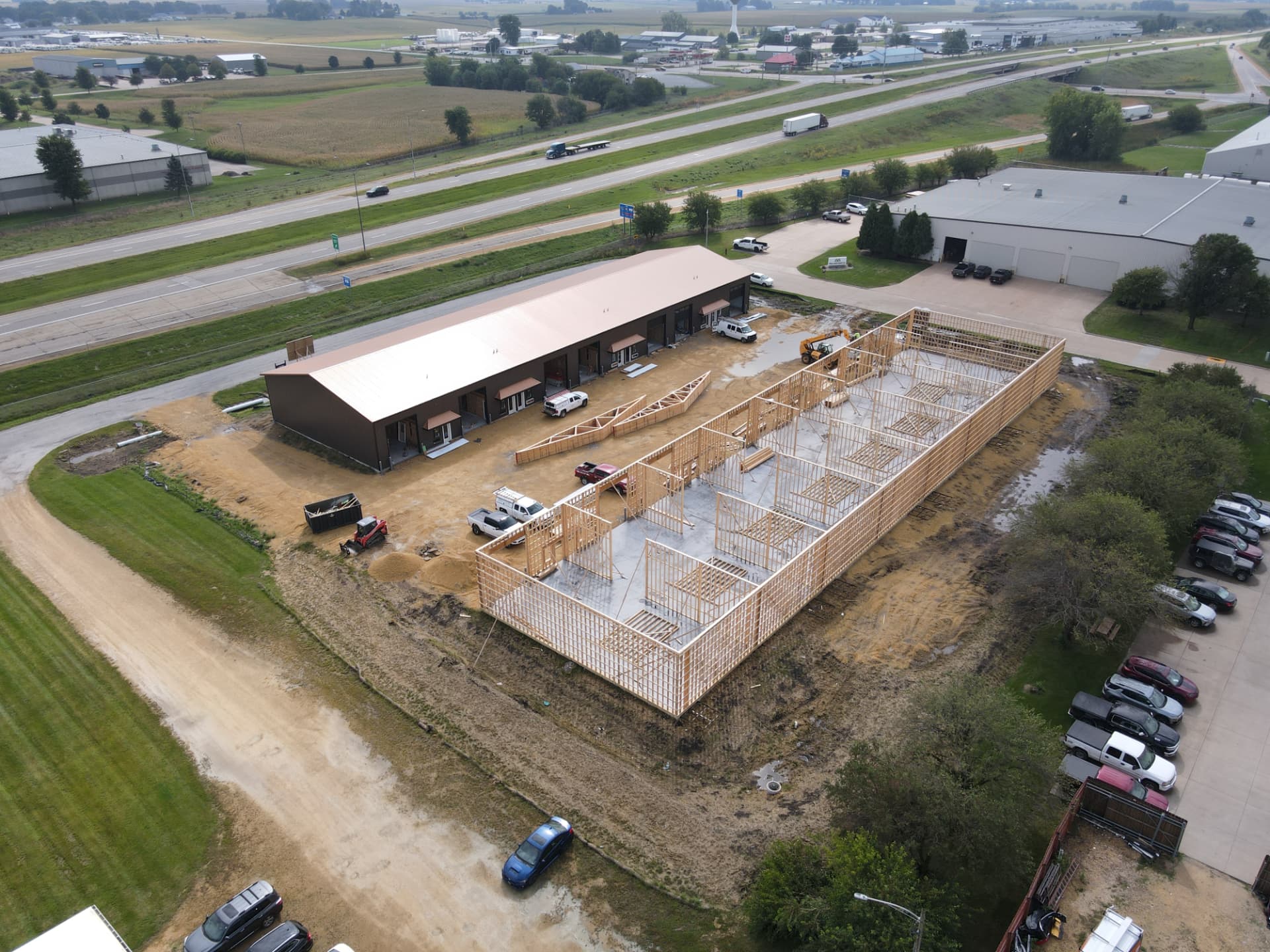 Aerial view of construction underway at the Divine Standards site in Eldridge, Iowa